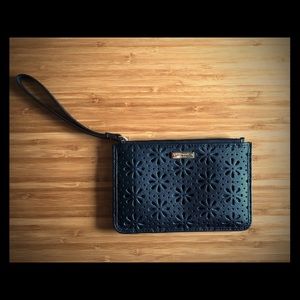 Kate Spade faux leather flower lace wristlet.